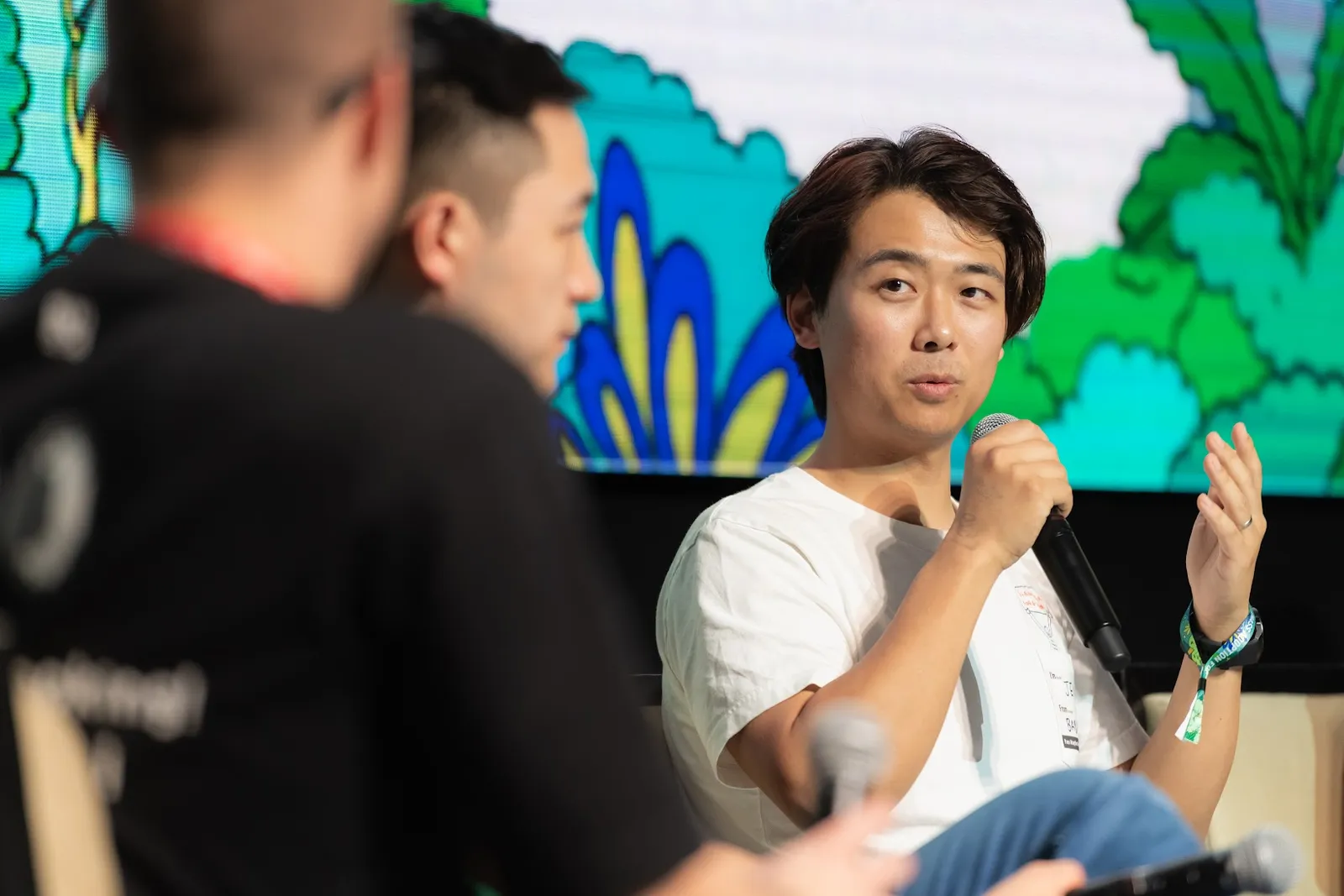 Jenks speaking on a conference panel